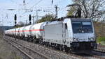 CTL Logistics GmbH, Berlin [D] mit der geleasten Akiem Lok  6186 267-1  [NVR-Nummer: 91 80 6186 267-1 D-AKIEM] und einem Ganzzug polnischer Druckgaskesselwagen (für Kohlenstoffdioxid, tiefgekühlt, flüssig) Richtung Polen am 16.04.26 Höhe Bahnhof Saarmund.