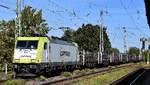 CCW - Captrain Deutschland CargoWest GmbH, G�tersloh [D] mit ihrer '186 158-2' [NVR-Nummer: 91 80 6186158-2 D-CCW] und einem Ganzzug Drehgestell-Flachwagen mit fabrikneuen Stahlrohren am 28.09.26 H�he Bahnhof Magdeburg-Neustadt, Viele Gr��e an den TF. !!!