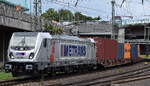containerzuege/921199/metrans-rail-deutschland-gmbh-leipzig-d METRANS Rail (Deutschland) GmbH, Leipzig [D] mit der geleasten Akiem Lok '187 506-1' [NVR-Nummer: 91 80 6187 506-1 D-AKIEM] verl�sst mit einem Containerzug den Hamburger Hafen am 28.07.26 H�he Bahnhof Hamburg-Harburg.