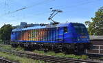 WLC - Wiener Lokalbahnen Cargo GmbH, Wien [A] mit der farblich toll gestalteten  187 323  [NVR-Nummer: 91 80 6187 323-1 D-WLC] am 12.08.26 H�he Bahnhof Magdeburg-Neustadt.