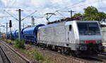 Akiem Leasinglok  189 209  [NVR-Nummer: 91 80 6189 209-0 D-AKIEM], aktueller Leasingnehmer? mit einem Ganzzug Sch�ttgutwagen mit Schwenkdach am 06.09.26 H�he Bahnhof Luckenwalde.