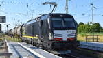 RTB CARGO GmbH, D�ren [D] mit der geleasten BRCE Dispo Vectron  X4 E - 634  [NVR-Nummer: 91 80 6193 634-3 D-DISPO] und einem Kesselwagenzug (Phenol, geschmolzen) am 24.06.26 Durchfahrt Bahnhof Falkenberg (Elster).