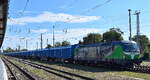 SETG - Salzburger Eisenbahn TransportLogistik GmbH, Salzburg [A] mit ihrer geleasten ELL Vectron   193 204   [NVR-Nummer: 91 80 6193 204-5 D-ELOC] kommt mit einem Gannzug Sch�ttgutcontainer mit Holzhackschnitzeln H�he Bahnhof Stendal Hbf.  am 14.09.26 an.