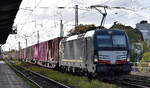 METRANS Rail s.r.o., Praha [CZ] mit der geleasten BRCE Dispo Vectron   X4 E - 621  [NVR-Nummer: 91 80 6193 621-0 D-DISPO] und einem Containerzug am 14.10.26 H�he Bahnhof Magdeburg Neustadt.