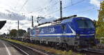 RTB CARGO GmbH, Aachen [D] mit der geleasten ELL Vectron   193 791  [NVR-Nummer: 91 80 6193 791-1 D-ELOC] und einem schwach ausgelastetem Containerzug am 14.10.26 H�he Bahnhof Magdeburg Neustadt.