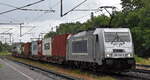 metrans-tschechien/887551/metrans-rail-sro-praha-cz-mit METRANS Rail s.r.o., Praha [CZ] mit ihrer '386 036-8' [NVR-Nummer: 91 54 7386 036-8 CZ-MT] und einem Containerzug am 07.07.25 Höhe Bahnhof Niederndodeleben.