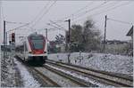 Der SBB RABe 522 203 verlässt Grandvillars in Richtung Delle, interessant sind die Signale mit ihre vielen Hinweisschildern und den Telefonen.
