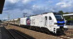 Heavy Haul Power International GmbH, Erfurt [D] mit der geleasten ELP Eurodual Lok   2159 251-8  [NVR-Nummer: 90 80 2159 251-8 D-ELP] und einem Baustoff-Schüttguttransportzug (leer) am 16.07.25 Höhe Bahnhof Luckenwalde.