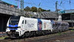 HHPI - Heavy Haul Power International GmbH, Erfurt [D] mit der geleasten ELP Eurodual Lok  21-224  [NVR-Nummer: 90 80 2159 224-5 D-ELP] und einem firmeneigenen Sch�ttgutf�rderzug am 27.08.26 H�he Bahnhof Hamburg-Harburg.