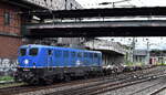Anhaltische-Brandenburgische Eisenbahn Gesellschaft mbH, Hamburg mit der  140 853-3  (NVR:  91 80 6140 853-3 D-EGP ) verl�sst mit einem Containerzug den Hamburger Hafen am 07.08.26 H�he Bahnhof Hamburg-Harburg.