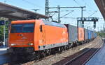 AMEH Trans - ArcelorMittal Eisenh�ttenstadt Transport GmbH, Eisenh�ttenstadt [D] mit ihrer  145-CL 005  [NVR-Nummer: 91 80 6145 096-4 D-EKO]  und einem Containerzug am 13.08.26 Durchfahrt Bahnhof Wittenberge.