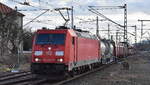 DB Cargo AG, Mainz [D] mit ihrer  185 283-9  [NVR-Nummer: 91 80 6185 283-9 D-DB] und einem gemischten Güterzug am 24.02.26 Durchfahrt Bahnhof Dessau Hbf.