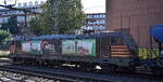 HSL Logistik GmbH, Hamburg [D] mit ihrer  187 537  [NVR-Nummer: 91 80 6187 537-6 D-HSL] und einem Getreidezug am 27.08.26 H�he Bahnhof Hamburg-Harburg. 