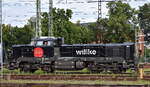 Willke Logistics GmbH, Ludwigslust [D] mit ihrer vossloh DE 18 Tage V Lok, Name:  Mall  [NVR-Nummer: 92 80 4185 143-9 D-WWL] und dem DB Bahngruppen Gleisumbauzug  B�ffel  + Beiwagen abends am 07.08.26 H�he Bahnhof Stendal Hbf.