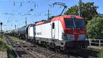 ORLEN Unipetrol Doprava, s.r.o., Litv�nov [CZ] mit ihrer Vectron  383 057-7  [NVR-Nummer: 91 54 7383 057-7 CZ-UNIDO] und einem Kesselwagenzug am 12.08.26 H�he Bahnhof Magdeburg-Neustadt.
