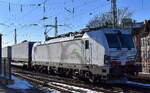 TX Logistik AG, Bad Honnef [D] mit ihrer recht neuen Vectron  7193 309  [NVR-Nummer: 91 80 7193 309-0 D-TXL] und einem KLV-Zug am 19.02.25 Höhe Bahnhof Magdeburg-Neustadt.