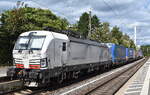 TXL - TX Logistik AG, Bad Honnef [D] mit ihrer Vectron  7193 318  [NVR-Nummer: 91 80 7193 318-1 D-TXL] und einem KLV-Zug am 15.09.26 Durchfahrt Bahnhof Uelzen.