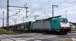 Crossrail Benelux N.V., Antwerpen-Borgerhout [B] mit der geleasten belgischen ATLU Lok   E 186 213  [NVR-Nummer: 91 88 7186 213-5 B-ATLU] und einem PKW-Transportzug am 01.10.25 Höhe