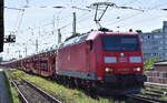 DB Cargo AG, Mainz [D] mit ihrer  185 183-1  [NVR-Nummer: 91 80 6185 183-1 D-DB] und einem PKW-Transportzug (fabrikneue SEAT Modelle) am 25.07.26 H�he Bahnhof Magdeburg-Neustadt.