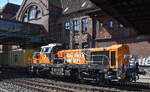 HRS - Hamburger Rail Service GmbH & Co. KG, Ahrensburg [D] mit ihrer neuen vossloh DE 18 Diesellok [NVR-Nummer: 92 80 4185 173-6 D-HRS] und einem Containerzug zur �bergabe im Hamburger Hafen am 27.08.26 H�he Bahnhof Hamburg-Harburg. 
