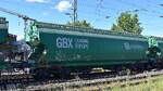 Drehgestell-Sch�ttgutwagen mit Schwenkdach und dosierbarer Schwerkraftentladung f�r Getreidetransporte vom Einsteller REENBRIER LEASING EUROPE BV mit der Nr. 37 TEN 80 D-GBXEU 0764 171-7 Tagnpps (GE) vermietet an die polnischen Fa. Dapeko Sp. z o. o. siehe Logo in einem Ganzzug am 18.05.26 H�he Bahnhof Magdeburg-Neustadt..