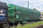 Drehgestell-Flachwagen mit vier Rads�tzen, verschiebbarem Planenverdeck und Lademulden f�r Coil-/Spaltbandtransporte vom Einsteller On Rail GmbH mit der Nr.