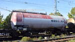 Kesselwagen vom Einsteller WASCOSA AG mit der Nr. 33 RIV 80 D-WASCO 796 5 010-8 Zas lt Aufkleber vom SKW Stickstoffwerke Piesteritz GmbH mit dem Ladegut AHL-D�nger bef�llt in einem Kesselwagenzug am 28.09.26 H�he Bahnhof Magdeburg Neustadt.