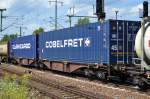COBELFRET ist ein belgischer Logistiker mit Sitz in Antwerben und daneben ein Container der CLdN Cargo die auf Transporte von Container zwischen Rotterdam und Irland spezialisiert sind, 01.08.14 Bhf. Flughafen Berlin-Schnefeld.