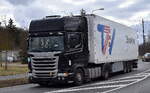 Ein SCANIA STREAMLINE Zugmaschine aus Litauen mit Trailer der Trans-West Services GmbH am 24.02.26 Bahnübergang Rodleben.