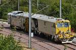 ETF Matisa Gleisstopfmaschine 99 87 9 124 538-9 bei der Arbeit an der Großbaustelle  oberhalb des Bahnhofs von Ettelbrück auf der Strecke in Richtung Michelau.