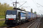 LTE Netherlands B.V.mit der MRCE Dispo ES 64 F4-200/189 200-9 mit der Werbefolie  CHENGDU - TILBURG - ROTTERDAM EXPRESS  und KLV-Zug am 28.09.17 Berlin-Hohenschönhausen.