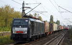DB Cargo mit der MRCE Dispo ES 64 F4-803/189 803-0 und Containerzug am28.09.17 Berlin-Hohenschönhausen.