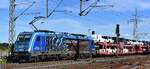 LTE Logistik- und Transport GmbH, Graz [A] mit ihrer  186 945-2  [NVR-Nummer: 91 80 6186 945-2 D-LTE] und einem PKW-Transportzug am 24.09.25 Höhe Bahnhof Rodleben.
