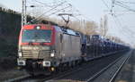 PKP Cargo mit EU46-508/193-508 und PKW-Transportzug (einige FORD Modelle geladen) Richtung Polen am 08.02.18 Berlin-Hohenschönhausen.