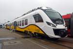 Der dreiteilige Elektrotriebwagen Newag Impuls WE36a - 011C der Koleje Dolnośląskie (deutsche �bersetzung: Niederschlesische Eisenbahn) ausgestellt auf der InnoTrans 2014 (hier am