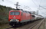 MEG 156 002-8 mit MEG 705/155 196-9 und Zementstaubzug (leer) Richtung Industrieübergabe Nordost am 19.01.18 Berlin-Hohenschönhausen.