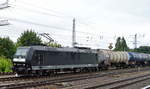 DB Cargo mit der MRCE 185 551-9 und Kesselwagenzug am 25.07.17 Berlin Springpfuhl.