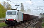 HSL mit der Railpool-Lok 185 636-8 mit Ganzzug offener Güterwagen mit staubiger Befüllung (REA-Gips) am 24.04.17 Berlin-Hohenschönhausen.
