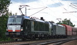 br-193-vectron-siemens/527603/db-cargo-mit-der-mrce-doppeltraktion DB Cargo mit der MRCE Doppeltraktion X4 E - 611 + X4 E - ??? mit Erzzug am 02.06.16 Berlin-Wuhlheide.