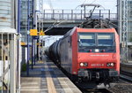 482 033-8 für HSL mit Kesselwagenzug (leer) Richtung Stendell am 27.04.16 Berlin-Hohenschönhausen.
