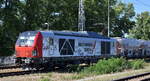 Rhomberg Sersa Gleisbau GmbH, Berlin [D] mit der von der BBW - Bahnbau Wels GmbH, Wels [A] angemieteten Vectron Dual Lok „248 997“  [NVR-Nummer: 90 80 2248 997-9 D-BBW] und einem Schotterzug (leer) am 30.06.25 Höhe Bahnhof Ruhland.