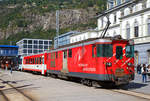   Geschoben von dem elektrischen Zahnradtriebwagen Deh 4 /4 – 55 „Brig“ erreicht der MGB Regionalzug von Andermatt am 16.09.2017 den Bahnhof Brig.