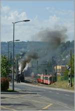 Eine Dampflok (oder eher Rauchlok) aus der Ferne: BFD N� bei der Abfahrt in Blonay Richtung Chamby am 19.