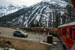 Unterwegs mit den beiden RhB ABe 4/4 III Triebwagen 54  Hakone  und  51  Poschiavo  am 21.03.2023 als PmG (Personenzug mit G�terbef�rderung) von Pontresina nach Poschiavo, hier geht es in der