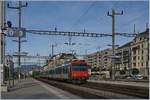 Der Regionalzug 7257 erreicht von Yverdon kommend sein Ziel Neuch�tel.