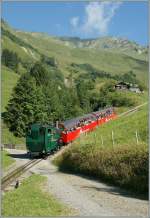 Und weiter geht die Fahrt Richtung Rothorn mit der BRB H 2/3 16 welche nun frisch getr�nkt ihren Zug N� 5 Bergw�rts schiebet.