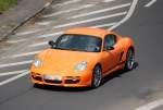 Porsche 911 Carrera S in orange, 05.05.11 Berliner Stadtautobahn Hhe ICC.