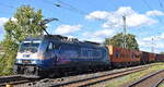 METRANS Rail s.r.o., Praha-Uhříněves [CZ] mit der geleasten Railpoool Lok  186 534-4  [NVR-Nummer: 91 80 6186 534-4 D-Rpool] und einem Containerzug am 15.09.25 Höhe Bahnhof