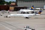 Eurowings Canadair Regional Jet CRJ-900ER (D-ACNP) wird aus der Parkposition geschoben Flughafen Berlin Tegel, 23.06.12